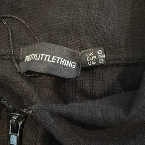 PrettyLittleThing Black Ribbed Zip-Up Top thumbnail 3