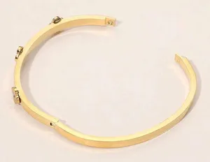 Stainless Steel Center Quatrefoil Station Hinged Bangle Bracelet thumbnail 2