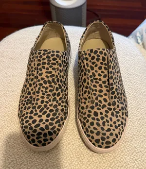J Slides Leopard Print Slip-On Sneakers in Tan and Black thumbnail 1