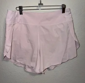 Athleta run with it shorts pastel pink thumbnail 1