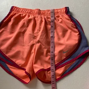Nike Dri-FIT Running Shorts Women’s Small Orange Athletic Gym Activewear Lightwe thumbnail 7