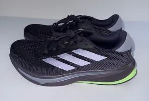 adidas women’s Black Athletic Shoes with White Stripes and Neon Green Accent thumbnail 1