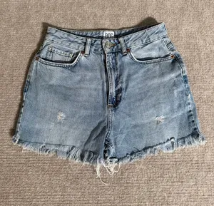 BDG Women’s Light Blue High-Rise Distressed Denim Cut Off Mom Shorts - Size 27 thumbnail 1