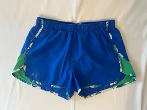 Under Armour Women’s Royal Blue Athletic Shorts with Green Accents thumbnail 1