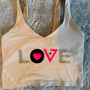 lululemon athletica Beige Crop Top with Pink and Black Accents thumbnail 1