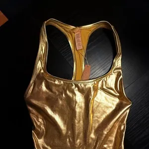 SKIMS Metallic Gold Cycle Suit Bodysuit Unitard Rare NWT Size S thumbnail 2