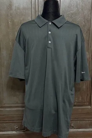 Nike Black Dri-Fit golf shirt - size XXL. Gently Warn & excellent condition. Measurements approximately 22” from armpit to armpit x 30” long. Non smoking home. priced to sell at as is condition. Don’t like my price, make reasonable offer! And thank you for checking my closet. thumbnail 1