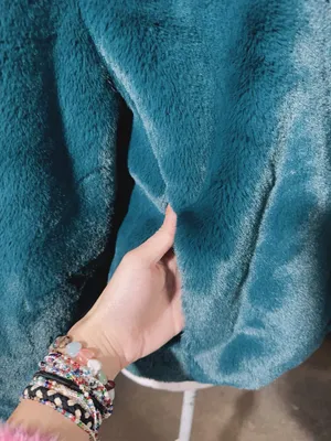 The Comfy rain + rose TEAL GREEN faux fur long sleeve jacket with pockets soft warm comfy New with tag Smoke and pets free Same day shipping Faux fur: No ANIMALS WERE HARMED IN THE MAKING OF THIS FASHION THIS GARMENT HAS BEEN HANDCRAFTED BY Rain + Rose STAFF FOR YOUR COMFORT thumbnail 7
