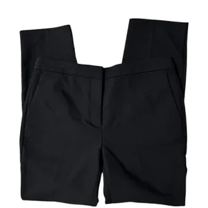 ZARA BASIC Collection Black trousers zip hem Back stripe straight leg size Lg The ZARA BASIC Collection Black trousers are stylish dress pants in size L with a zip hem feature and back stripe accents. Made from a fabric blend of blended polyester, these pants have a straight leg style and pockets for added convenience. Perfect for casual occasions in the summer, fall, and spring, these trousers are machine washable for easy care. The black pants with stripes offer a city-inspired theme, making them a versatile and chic addition to any woman's wardrobe. thumbnail 4