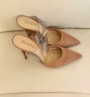 Sionne Clear Strap Pointed Toe Mule from the luxury footwear brand Schutz. Its avant-garde design combines classic elegance with modern details. Size 7 thumbnail 4