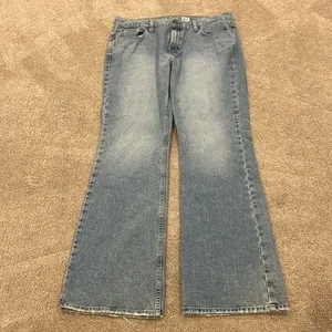 Old Navy women’s boot-cut low waist jeans size 12. thumbnail 1