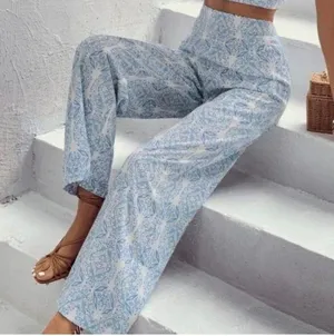 Wide Leg High Waisted light blue and white pants women's size Medium New thumbnail 1