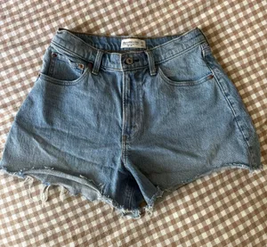 light-wash Abercrombie & Fitch high-rise relaxed cutoff denim shorts thumbnail 1