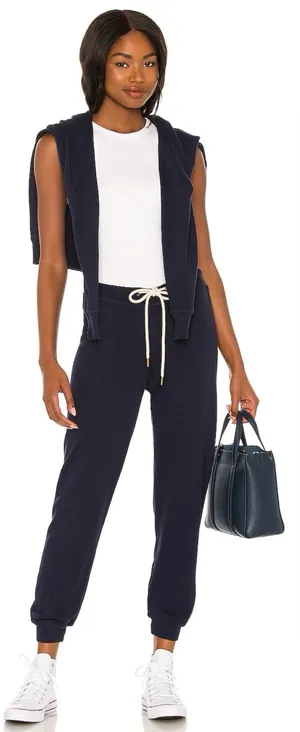 THE GREAT. • The Cropped Sweat Pant in True Navy blue terry knit slouchy jogger thumbnail 1