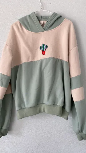 light green and cream colored cactus hoodie thumbnail 1