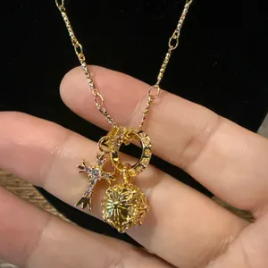 Gold Cross Orb Pendant Necklace thumbnail 3