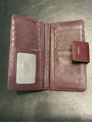 Fossil pebbled leather tab clutch wallet in a deep burgundy or berry color thumbnail 7