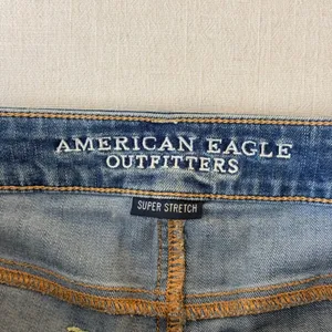 American Eagle Distressed Super Stretch Low Rise Shortie Denim Shorts Womens 2 thumbnail 10