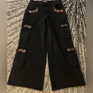 DOLLS KILL X STRAWBERRY SHORTCAKE PATCHED WITH LOVE CARGO PANTS size M thumbnail 3