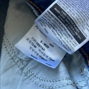 Denizen from Levi's Distressed Blue Low Rise Jeans thumbnail 13
