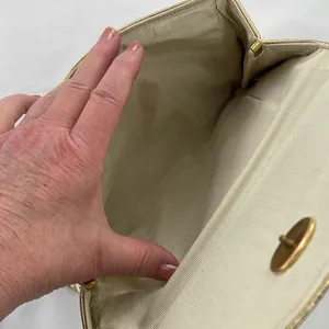 Shimmering Vintage faux leather gold clutch. thumbnail 6