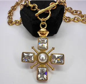 Chunky gold cross necklace with pearl and toggle clasp thumbnail 3