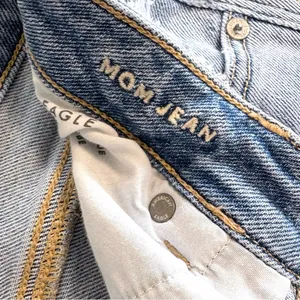 American Eagle Stretch Ripped High Rise Mom Jean in Emotional Blue Size 12 thumbnail 13
