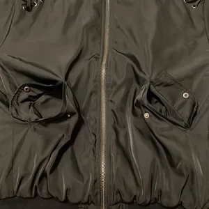 Article size M black with orange lining zip front bomber jacket EUC Size M thumbnail 6