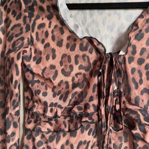 Sheer Ruffle Leopard Blouse thumbnail 2