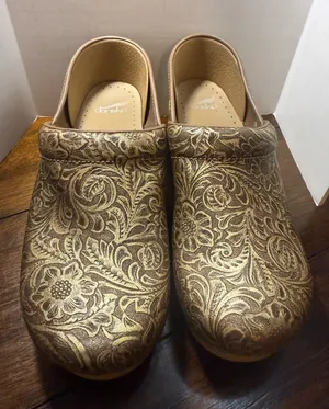 Dansko Metallic Gold Floral Embossed Clogs thumbnail 1