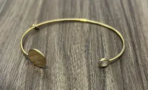 Anthropologie Elegant Gold Bangle Bracelet “L” thumbnail 1
