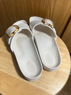 Birkenstock White Slide Sandals with Gold Buckle thumbnail 3