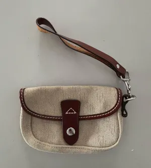 VINTAGE Dooney & Bourke | classic D&B logo wristlet. thumbnail 1
