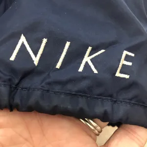 Vintage Nike woman’s size large 12-14 navy and white lined 1/4 zip windbreaker thumbnail 6