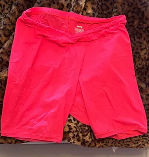 SKIMS Vibrant Coral Colored Thin Bike Shorts thumbnail 1