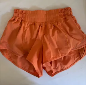 Orange Lululemon Shorts thumbnail 1