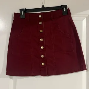 Maroon mini skirt with gold buttons thumbnail 1