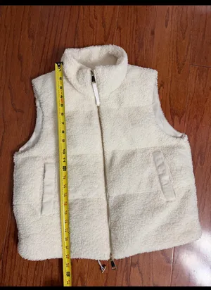 SHEIN Cream sherpa fleece fluffy puffer Zip up Vest with bag - size Medium. ***refer to measurements for size. Gently Warn and excellent condition. Measurements approximately from armpit to armpit 21” not fully stretched out x 22” long. Non-smoking home. Priced at as is condition. Don’t like my price make a reasonable offer! And thank you for checking my closet! thumbnail 8