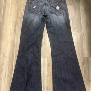 7 For All Man Kind Dark wash flare jeans with a 27”waist and 30" inseam #flares thumbnail 2