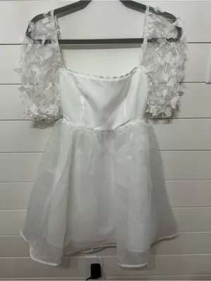 Mini dress with butterfly sleeves thumbnail 1
