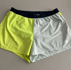 The North Face Colorblock Yellow Gray Athletic Shorts Women's Size XL thumbnail 1