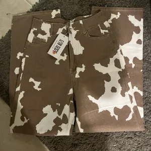 12th Tribe Women’s Cow Print Brown & White Jeans- 48% Off and ! thumbnail 1
