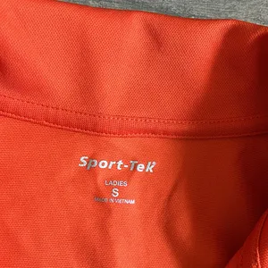 Sport tek orange polo shirt with dog embroidery thumbnail 2