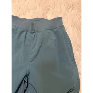 Halara Women's Sz XS High Waist Eyelet 2-in-1 Zip Hem Running Joggers Stone Blue thumbnail 7