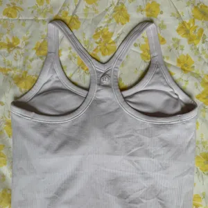Lululemon Ebb To Street Tank Top in Flush Pink Size 8 thumbnail 6
