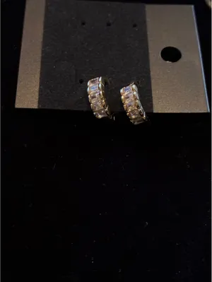 Gold tone CZ Huggie Hoops | Baguette + Round Crystals thumbnail 3