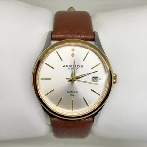 Akribos XXIV Diamond Dial Two Tone Date women Quartz Watch 34mm Sapphire running thumbnail 1