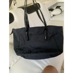 Agnès b. Voyage small black nylon bag with strap details. thumbnail 7