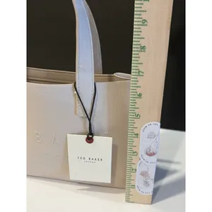Ted Baker Icon small tote bag in a cream-colored, structured material. thumbnail 6