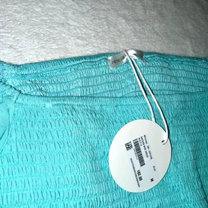 NWT Women’s WAPG Raegan Blue Teal Cutout Mini Dress size Medium thumbnail 5